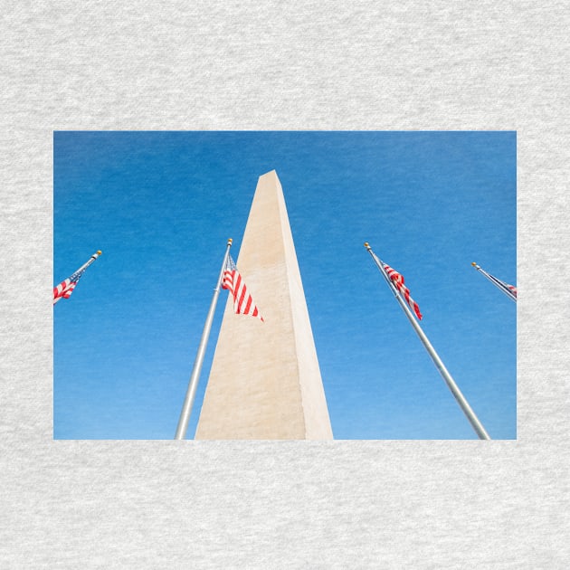 Washington Monument tall obelisk in National Mall Washington DC commemorating George Washington with flags by brians101